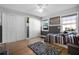 Bedroom featuring natural light, wood floors, and neutral decor at 8992 Palos Verde Dr, Orlando, FL 32825