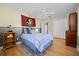 Bedroom with ceiling fan and Florida State University banner at 8992 Palos Verde Dr, Orlando, FL 32825