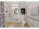 Accessible bathroom featuring a step-in shower and safety bars for added convenience at 1001 Park Ridge Cir, Kissimmee, FL 34746