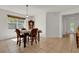 Cozy dining room with natural light and tile flooring at 10081 Cobalt Bay Rd, Orlando, FL 32827