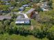 Aerial view of a single-Gathering home showcasing its landscaping, enclosed patio, and surrounding neighborhood at 1021 Mare Bello Dr, Winter Park, FL 32792