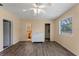 Large laundry room featuring a washer, dryer, two doorways, and a bright window at 1021 Mare Bello Dr, Winter Park, FL 32792