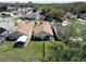 Aerial view of a neighborhood featuring well-maintained homes and mature trees at 11624 Peach Grove Ln, Orlando, FL 32821