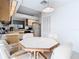 Bright dining area connects directly to kitchen for easy enjoyment and offers great natural lighting at 11624 Peach Grove Ln, Orlando, FL 32821