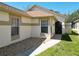 Inviting home exterior featuring a stone accent garden, and well-maintained landscaping, providing a warm, welcoming feel at 11624 Peach Grove Ln, Orlando, FL 32821