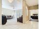 Spacious living room featuring a comfortable sofa, fan, and carpet, creating a cozy and inviting atmosphere at 11624 Peach Grove Ln, Orlando, FL 32821