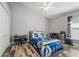 Bedroom featuring vaulted ceilings, wood floors, and a desk at 124 Windsor Cresent St, Winter Springs, FL 32708