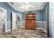 Bright bedroom showcasing wood floors and a wooden dresser with ample storage at 124 Windsor Cresent St, Winter Springs, FL 32708