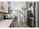 Spacious kitchen with modern stainless steel appliances, countertops, and tile backsplash at 124 Windsor Cresent St, Winter Springs, FL 32708