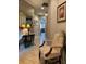 Hallway featuring neutral tones, tile flooring, and ornate decor at 1247 Travertine Ter, Sanford, FL 32771