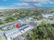 Aerial view of neighborhood near Downtown Winter Garden, with lake views and landscaping at 1312 Painted Bunting Ave, Oakland, FL 34787