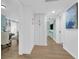 Hallway with built-in storage cabinets connecting the dining area to the living room at 1407 E Kaley St, Orlando, FL 32806