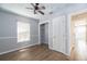 Bedroom features stylish light blue paint and wood look tile at 1432 W Yale St, Orlando, FL 32804