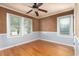 Cozy bedroom featuring beautiful hardwood floors and natural light at 1432 W Yale St, Orlando, FL 32804