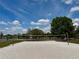 Enjoy outdoor activities on a sandy volleyball court, perfect for games under a sunny sky at 1509 Jason St, Kissimmee, FL 34744