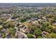 Aerial view showcasing the well-established neighborhood with tree-lined streets at 1518 Coletta Dr, Orlando, FL 32807