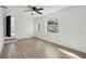 Bright bedroom featuring two windows and neutral walls, offering a versatile space at 1518 Coletta Dr, Orlando, FL 32807