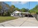 Home exterior featuring a front porch and car port at 1518 Coletta Dr, Orlando, FL 32807