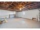 Unfinished basement with neutral walls and light-colored concrete flooring at 1610 Stephanie Ln, Lakeland, FL 33813