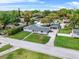 Charming single-story home with a well-manicured lawn and a detached garage at 1610 Stephanie Ln, Lakeland, FL 33813