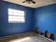 Empty bedroom with window, ready for renovation at 1838 Windmill Dr, Orlando, FL 32818