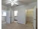 Generous main bedroom that includes ensuite bathroom, walk-in closet, and neutral walls at 19920 Villa Ridge Dr # 206, Orlando, FL 32821