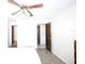 Bedroom with a ceiling fan and doorway to other rooms at 209 Esplanade Way # 109, Casselberry, FL 32707