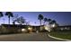 Night view of the community building with an American flag at 209 Esplanade Way # 109, Casselberry, FL 32707