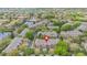 Panoramic aerial view of the residential community showcasing its layout, green spaces, and amenities at 2864 Polana St # 104, Orlando, FL 32835