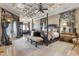 Lavish main bedroom with a coffered ceiling, sitting area, and luxurious furnishings at 3402 Cocard Ct, Windermere, FL 34786