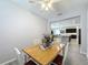 Dining area showcasing an open layout concept and view into the living room and kitchen at 434 Alcove Dr, Groveland, FL 34736