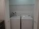 Convenient laundry area featuring a washer and dryer, perfect for easy chore management at 445 Live Oak Ave, Chuluota, FL 32766