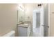 Bathroom featuring granite counters, new fixtures, and white cabinets at 4906 Cortez Dr, Orlando, FL 32808