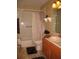 Cozy bathroom featuring a shower-tub combination, vanity, and neutral-toned walls at 506 Freeman St, Longwood, FL 32750