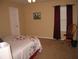 Bedroom with red curtains and a white door at 506 Freeman St, Longwood, FL 32750