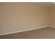 A bedroom with neutral colored walls and carpeted flooring at 506 Freeman St, Longwood, FL 32750