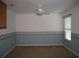 Cozy bedroom with ceiling fan and natural light; ready for your personal touch at 506 Freeman St, Longwood, FL 32750