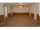 Large bonus room with neutral walls, carpeting, and plenty of space for activities at 506 Freeman St, Longwood, FL 32750