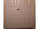 White double closet doors with a silver handle at 506 Freeman St, Longwood, FL 32750