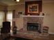 Cozy living room featuring a brick fireplace, and traditional decor at 506 Freeman St, Longwood, FL 32750