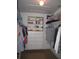 Well-organized walk-in closet with shelving and drawers offers ample storage space for clothing and accessories at 506 Freeman St, Longwood, FL 32750