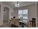 Elegant dining room featuring a modern table set with comfortable chairs, perfect for Gathering gatherings at 5201 Villa Rosa Ave, St Cloud, FL 34771