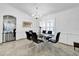 Dining room featuring a modern chandelier and seating for six at 6145 Froggatt St, Orlando, FL 32835