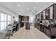 Spacious kitchen featuring dark wood cabinets, stainless steel appliances, and tile flooring at 6145 Froggatt St, Orlando, FL 32835