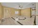 Bright living room featuring neutral walls and tile flooring at 7529 Winter Shade Dr, Orlando, FL 32822