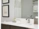 Bathroom with a sleek countertop and a faucet with running water at 7740 Sandy Ridge Dr # 136, Reunion, FL 34747