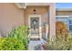 A welcoming front door with decorative wreath, plants, and a 'Welcome' sign creates a warm entrance at 789 Kangaroo Ct, Deltona, FL 32738