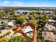 An aerial view of a beautiful home with a pool surrounded by lush landscaping at 8905 South Bay Dr, Orlando, FL 32819