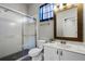 Bathroom featuring a shower-tub combo and vanity with a marble countertop at 8905 South Bay Dr, Orlando, FL 32819