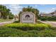 Elegant South Bay community sign surrounded by lush landscaping at 8905 South Bay Dr, Orlando, FL 32819